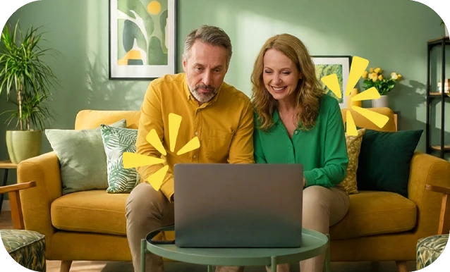 Coppia di mezza età che simula un mutuo sul sito di Credem tramite PC