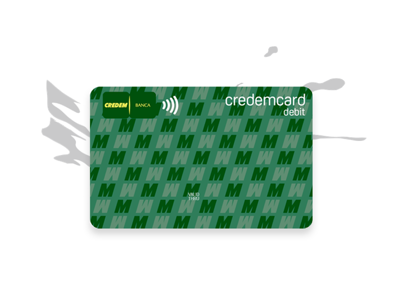 Carta di debito credemcard Nazionale di colore verde e una grafica sequenziale con M maiuscole e M maiuscole rovesciate, logo della banca e icona contactless. “Credemcard internazionale debit”
