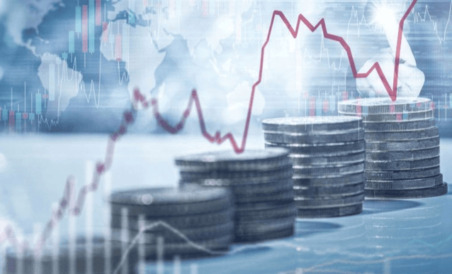 pile di monete con un grafico