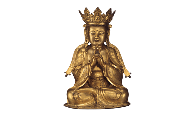Statua in bronzo dorato raffigurante Bodhisattva,raffigurato con le gambe incrociate nella postura di meditazione e sul suo petto è incisa la svastica, che significa l’“infinito” presente nella coscienza di un Buddha.